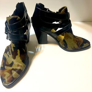 Beautiful camo hair-calf heeled booties with cut outs.  Sexy!